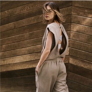 Free People medium Throw and go onesie. Excellent condition. Worn once. Cement